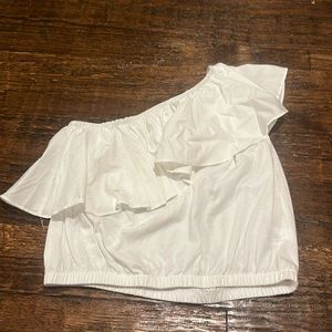 white target one shoulder with ruffle white top